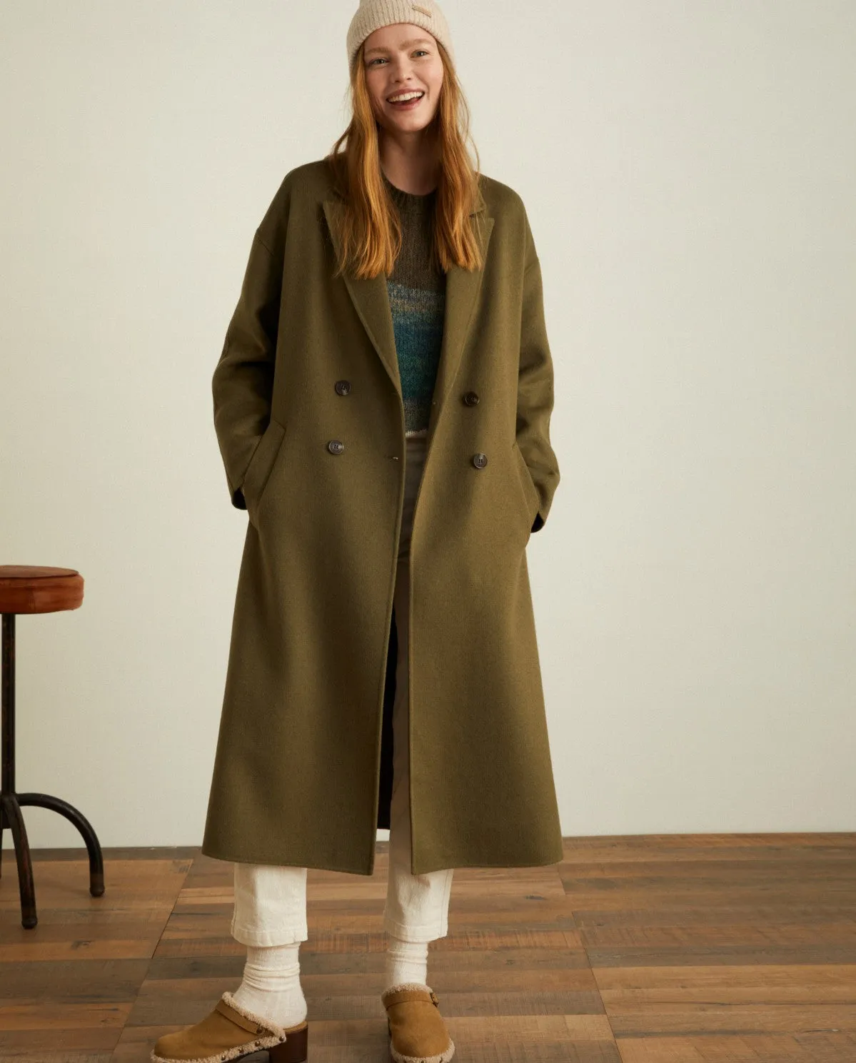 Green handmade long coat by YERSE