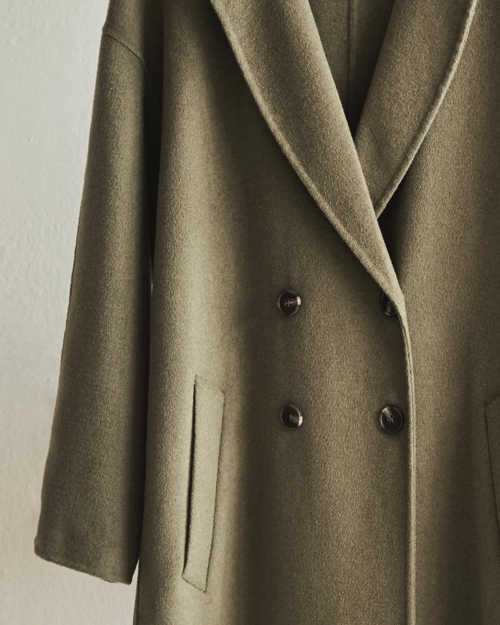 Green handmade long coat by YERSE